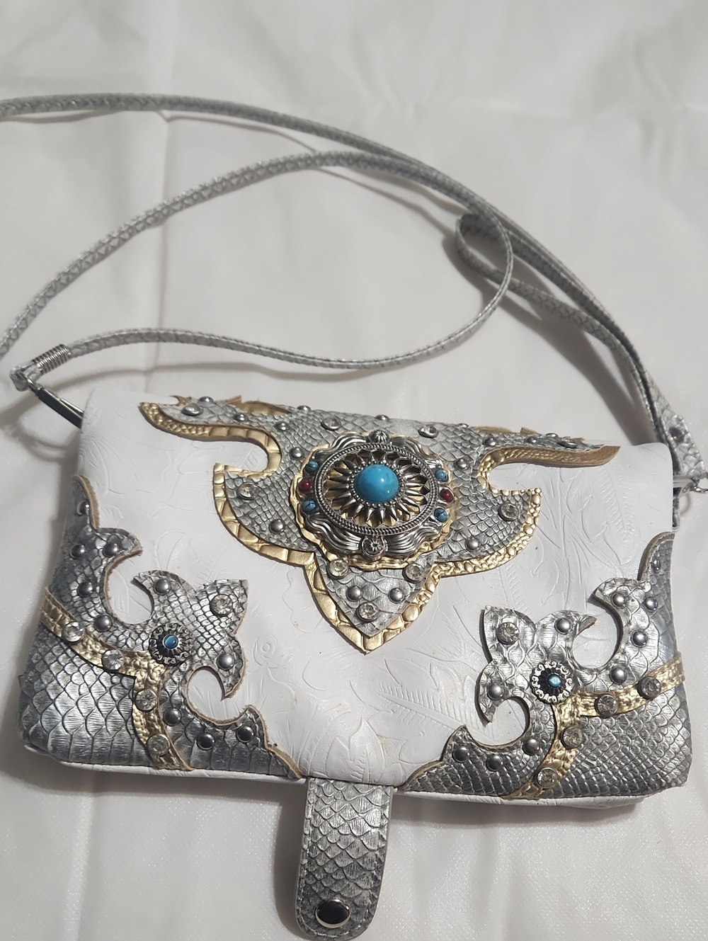White Crossbody Bag with Silver & Gold Embellishments and Turquoise Accent